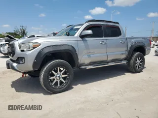 2017 Toyota Tacoma SR z VIN 5TFAX5GN9HX090668, wystawiony jako Copart lot #53887075 z przebiegiem 52 273 mil mil oraz Szkoda całkowita • Salvage title. Historia ofert i sprzedaży dostępna na DreamBid. Obrazek 1.