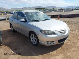 2006 Mazda Mazda3 s Grand Touring with VIN JM1BK323761401222, listed as a IAAI auction lot 42046430 with 124,230 mi miles. Bid and sale history available at carsss.com. Image 1.