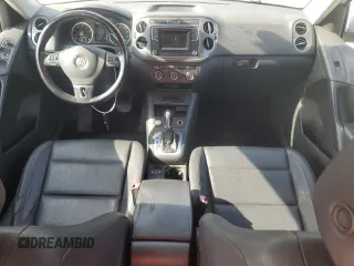 2016 Volkswagen Tiguan SE z VIN WVGBV7AX1GW528888, wystawiony jako Copart lot #59057125 z przebiegiem 143 688 mil mil oraz Czysty tytuł • Clean title. Historia ofert i sprzedaży dostępna na DreamBid. Obrazek 8.