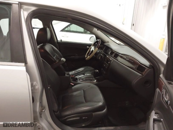 2013 Chevrolet Impala LTZ with VIN 2G1WC5E37D1241848, listed as a IAAI auction lot 41863719 with 167,482 mi miles. Bid and sale history available at carsss.com. Image 5.