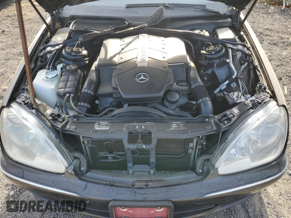 2003 Mercedes-Benz S-Class 5.0L with VIN WDBNG75J13A343070, listed as a Copart auction lot 77412604 with 154,533 mi miles and Salvage Title. Bid and sale history available at carsss.com. Image 11.