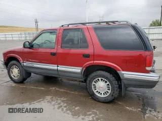 1997 GMC Jimmy SLS with VIN 1GKDT13W8V2515536, listed as a Copart auction lot 66701094 with 123,051 mi miles and Salvage Title. Bid and sale history available at carsss.com. Image 2.