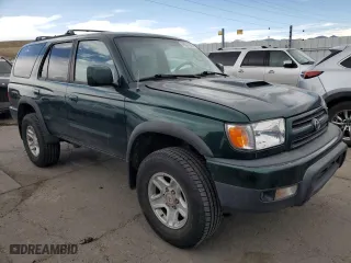 1999 Toyota 4Runner SR5 with VIN JT3HN86R9X0250487, listed as a Copart auction lot 49077965 with 221,954 mi miles and Salvage Title. Bid and sale history available at carsss.com. Image 4.