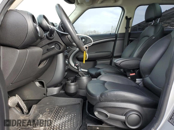 2016 MINI Countryman S with VIN WMWZC3C58GWT08173, listed as a Copart auction lot 44627235 with 76,814 mi miles and Salvage title. Bid and sale history available at DreamBid. Image 7.