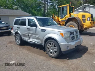 2011 Dodge Nitro Heat z VIN 1D4PU4GKXBW590907, wystawiony jako IAAI lot #42198828 z przebiegiem 171 988 mil mil oraz . Historia ofert i sprzedaży dostępna na DreamBid. Obrazek 1.