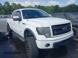2014 Ford F-150 XL with VIN 1FTFW1ET3EFB42154, listed as a IAAI auction lot 42656209 with 297,149 mi miles and . Bid and sale history available at DreamBid. Image 1.