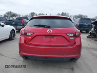 2018 Mazda 3 Touring with VIN 3MZBN1L37JM167604, listed as a IAAI auction lot 41623232 with 118,974 mi miles. Bid and sale history available at carsss.com. Image 17.