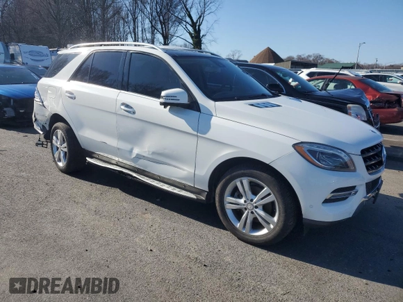 2014 Mercedes-Benz M 350 with VIN 4JGDA2EB1EA323572, listed as a Copart auction lot 45164015 with 141,111 mi miles and Salvage Title. Bid and sale history available at DreamBid. Image 4.