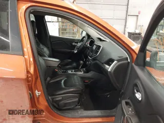 2015 Jeep Cherokee Trailhawk with VIN 1C4PJMBS5FW524462, listed as a IAAI auction lot 41774347 with 107,592 mi miles. Bid and sale history available at carsss.com. Image 5.