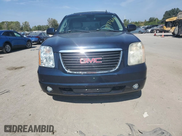 2007 GMC Yukon SLT with VIN 1GKFK13057J345796, listed as a Copart auction lot 71773124 with 218,788 mi miles and Salvage Title. Bid and sale history available at DreamBid. Image 5.