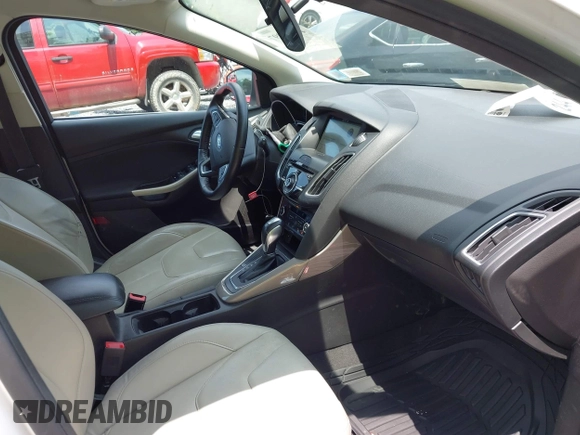 2016 Ford Focus Titanium with VIN 1FADP3N26GL332709, listed as a IAAI auction lot 42458997 with 75,509 mi miles and . Bid and sale history available at DreamBid. Image 5.