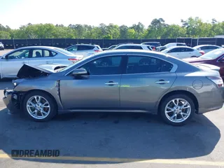 2014 Nissan Maxima S with VIN 1N4AA5AP9EC467259, listed as a IAAI auction lot 41998190 with 157,055 mi miles and . Bid and sale history available at DreamBid. Image 14.