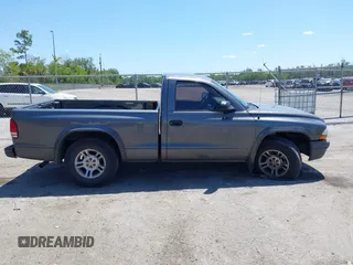 2003 Dodge Dakota with VIN 1D7FL16X53S361797, listed as a IAAI auction lot 42056555 with 243,771 mi miles and . Bid and sale history available at carsss.com. Image 14.