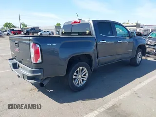 2016 GMC Canyon 4WD SLT with VIN 1GTP6DE15G1323650, listed as a IAAI auction lot 42097101 with 240,662 mi miles. Bid and sale history available at carsss.com. Image 4.