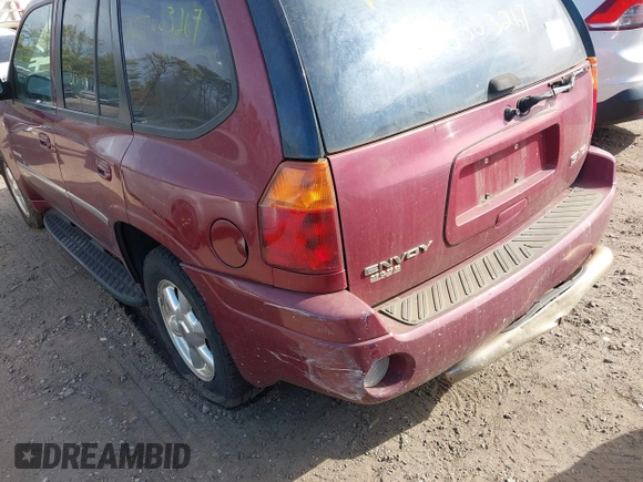 2006 GMC Envoy SLT with VIN 1GKDT13S362145045, listed as a IAAI auction lot 41916115 with Not Provided miles and . Bid and sale history available at DreamBid. Image 6.
