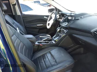 2016 Ford Escape Titanium with VIN 1FMCU0J95GUC41632, listed as a IAAI auction lot 41692040 with 144,834 mi miles. Bid and sale history available at carsss.com. Image 5.