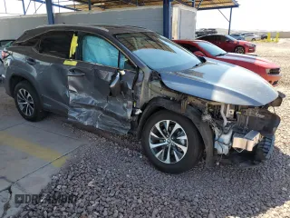 2020 Lexus RX with VIN 2T2AGMDAXLC048248, listed as a Copart auction lot 67398504 with 15,946 mi miles and Salvage Title. Bid and sale history available at carsss.com. Image 4.