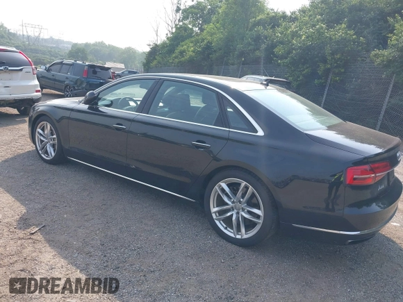 2015 Audi A8 4.0T z VIN WAU32AFD6FN031625, wystawiony jako IAAI lot #42498415 z przebiegiem 95 130 mil mil oraz . Historia ofert i sprzedaży dostępna na DreamBid. Obrazek 3.