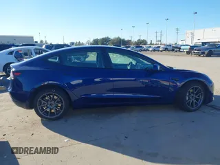 2023 Tesla Model 3 with VIN 5YJ3E1EA6PF505252, listed as a IAAI auction lot 41380172 with 31,141 mi miles and . Bid and sale history available at DreamBid. Image 12.