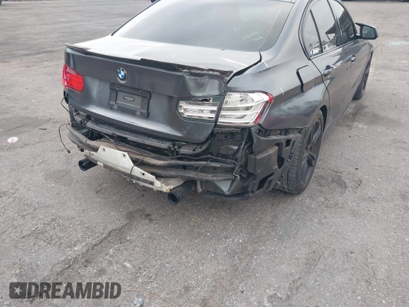 2014 BMW 3 Series 335i with VIN WBA3A9C56EF479564, listed as a IAAI auction lot 41578397 with 136,637 mi miles. Bid and sale history available at carsss.com. Image 6.