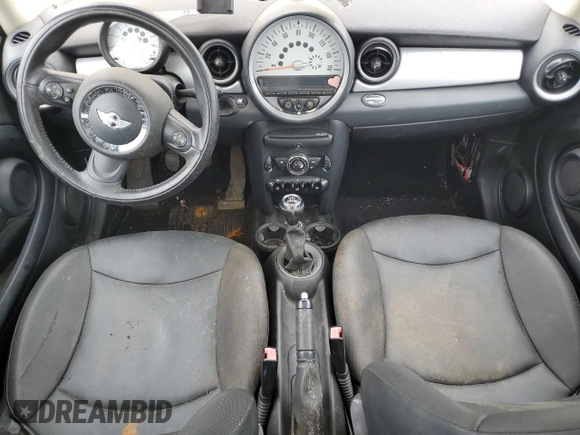 2011 MINI Hardtop with VIN WMWSU3C58BTX96968, listed as a Copart auction lot 62560915 with 88,616 mi miles and Salvage title. Bid and sale history available at DreamBid. Image 8.