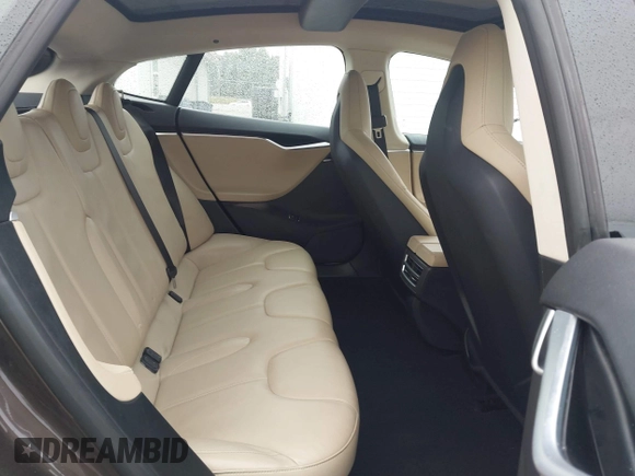 2013 Tesla Model S с VIN 5YJSA1CG0DFP14013, выставлен на аукционе IAAI как лот 42352134 с пробегом 99 996 миль миль и . История ставок и продаж доступна на DreamBid. Изображение 8.