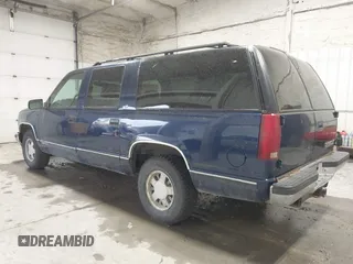 1999 Chevrolet Suburban with VIN 3GNEC16RXXG237570, listed as a IAAI auction lot 40210234 with 176,902 mi miles. Bid and sale history available at carsss.com. Image 3.