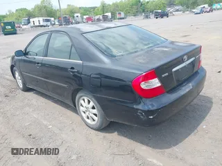 2003 Toyota Camry LE with VIN 4T1BE30K33U243758, listed as a IAAI auction lot 42169032 with 260,336 mi miles and . Bid and sale history available at DreamBid. Image 3.