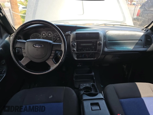 2005 Ford Ranger XLT z VIN 1FTZR45E05PA33894, wystawiony jako Copart lot #60548815 z przebiegiem 154 796 mil mil oraz Czysty tytuł • Clean title. Historia ofert i sprzedaży dostępna na DreamBid. Obrazek 9.