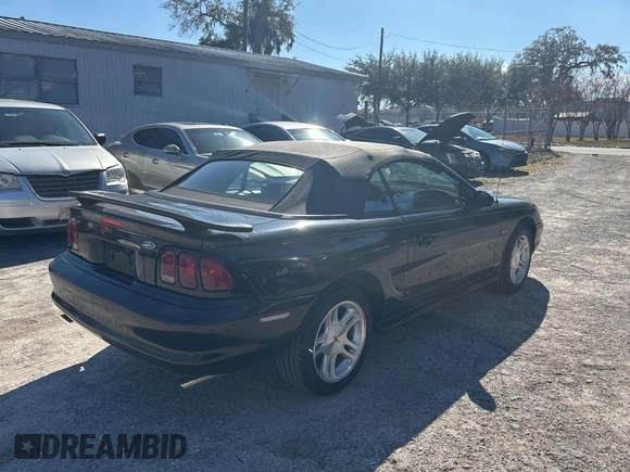 1998 Ford Mustang GT with VIN 1FAFP45X3WF197020, listed as a Copart auction lot 43796325 with 74,844 mi miles and Salvage Title. Bid and sale history available at carsss.com. Image 4.