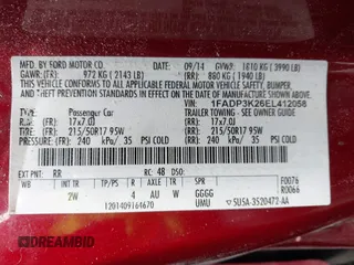 2014 Ford Focus SE with VIN 1FADP3K26EL412058, listed as a IAAI auction lot 42073435 with 119,568 mi miles. Bid and sale history available at carsss.com. Image 9.