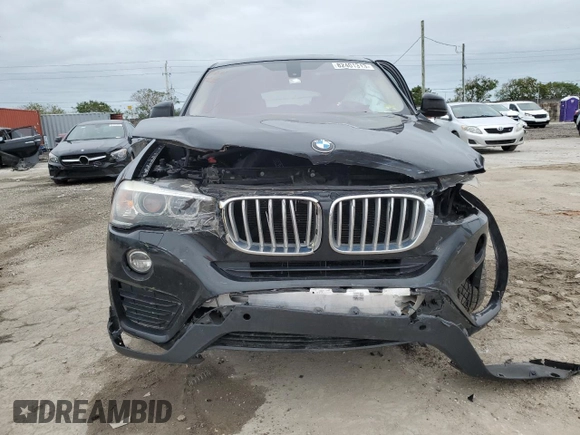2015 BMW X4 xDrive28i with VIN 5UXXW3C51F0M88632, listed as a Copart auction lot 82401313 with 0 mi miles. Bid and sale history available at carsss.com. Image 5.