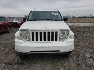 2010 Jeep Liberty Sport with VIN 1J4PP2GK9AW133958, listed as a Copart auction lot 47265675 with 124,466 mi miles and Salvage Title. Bid and sale history available at DreamBid. Image 5.