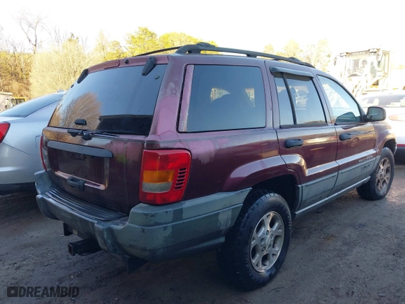 2001 Jeep Grand Cherokee Laredo with VIN 1J4GW48S11C578001, listed as a IAAI auction lot 41671318 with 263,694 mi miles. Bid and sale history available at carsss.com. Image 4.