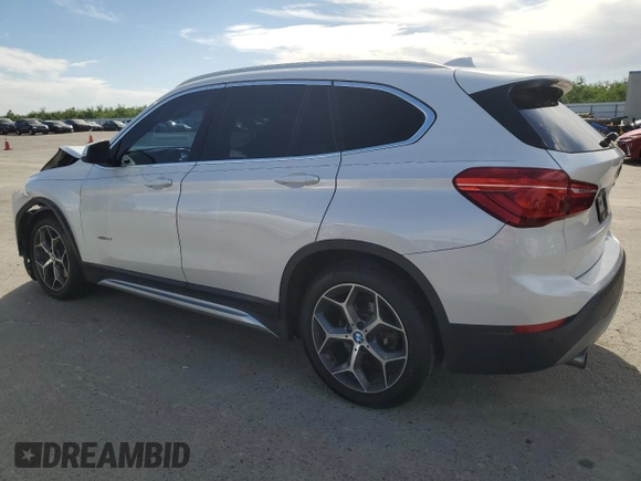 2016 BMW X1 xDrive28i z VIN WBXHT3C31GP880552, wystawiony jako Copart lot #52931305 z przebiegiem 127 225 mil mil oraz Szkoda całkowita • Salvage title. Historia ofert i sprzedaży dostępna na DreamBid. Obrazek 2.