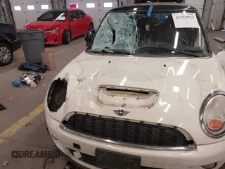 2009 MINI Hardtop S with VIN WMWMF73509TW85898, listed as a IAAI auction lot 41559954 with 97,186 mi miles and . Bid and sale history available at DreamBid. Image 6.