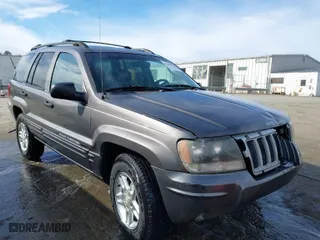 2004 Jeep Grand Cherokee Laredo with VIN 1J4GX48S94C350975, listed as a IAAI auction lot 41688700 with 252,654 mi miles. Bid and sale history available at carsss.com. Image 1.