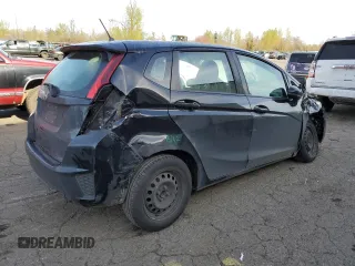 2017 Honda Fit LX with VIN 3HGGK5G55HM701215, listed as a Copart auction lot 50043395 with 186,805 mi miles and Salvage Title. Bid and sale history available at carsss.com. Image 3.