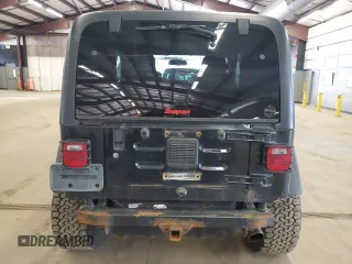 2004 Jeep Wrangler Sport with VIN 1J4FA49S64P722986, listed as a Copart auction lot 51840985 with 129,761 mi miles and Clean Title. Bid and sale history available at carsss.com. Image 6.