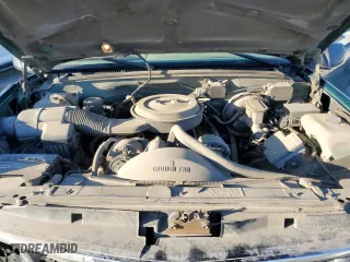 1995 Chevrolet Tahoe with VIN 1GNEK13K0SJ445250, listed as a Copart auction lot 82987024 with 125,517 mi miles and Salvage Title. Bid and sale history available at carsss.com. Image 12.