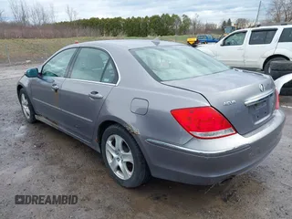 2006 Acura RL z VIN JH4KB165X6C006938, wystawiony jako IAAI lot #41936024 z przebiegiem 235 390 mil mil oraz . Historia ofert i sprzedaży dostępna na DreamBid. Obrazek 3.