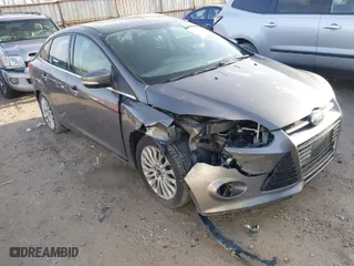 2012 Ford Focus Titanium with VIN 1FAHP3J2XCL421412, listed as a IAAI auction lot 41721565 with 117,632 mi miles. Bid and sale history available at carsss.com. Image 1.