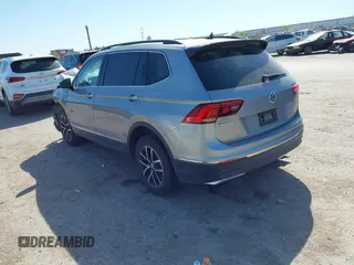 2021 Volkswagen Tiguan SE with VIN 3VV3B7AXXMM116774, listed as a IAAI auction lot 41868796 with Not Provided miles and . Bid and sale history available at DreamBid. Image 3.