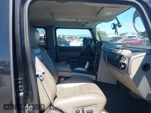 2003 Hummer H2 z VIN 5GRGN23U63H117676, wystawiony jako IAAI lot #41816411 z przebiegiem Nie podano mil oraz . Historia ofert i sprzedaży dostępna na DreamBid. Obrazek 5.
