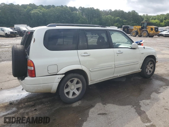 2002 Suzuki XL7 Standard z VIN JS3TY92V024106089, wystawiony jako Copart lot #58418685 z przebiegiem 232 254 mil mil oraz Szkoda całkowita • Salvage title. Historia ofert i sprzedaży dostępna na DreamBid. Obrazek 3.