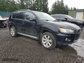 2010 Mitsubishi Outlander XLS with VIN JA4JT4AX4AZ009743, listed as a Copart auction lot 52824925 with 117,984 mi miles and Clean Title. Bid and sale history available at carsss.com. Image 4.