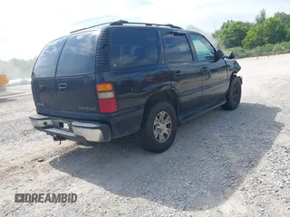 2002 Chevrolet Tahoe LS with VIN 1GNEC13Z12R249412, listed as a IAAI auction lot 42658863 with 261,383 mi miles and . Bid and sale history available at DreamBid. Image 4.