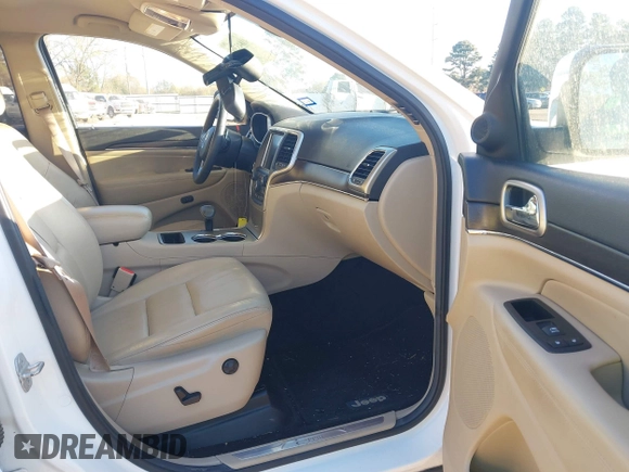 2014 Jeep Grand Cherokee Limited with VIN 1C4RJEBG9EC414265, listed as a IAAI auction lot 41843360 with 118,767 mi miles and . Bid and sale history available at DreamBid. Image 5.