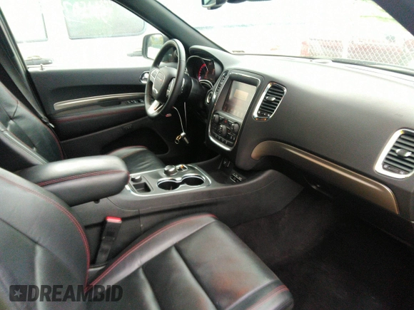 2016 Dodge Durango R/T with VIN 1C4SDJCT3GC375446, listed as a IAAI auction lot 32697478 with 83,030 mi miles and . Bid and sale history available at DreamBid. Image 5.