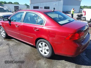 2009 Kia Optima LX z VIN KNAGE228395367017, wystawiony jako IAAI lot #42310556 z przebiegiem 234 760 mil mil oraz . Historia ofert i sprzedaży dostępna na DreamBid. Obrazek 3.